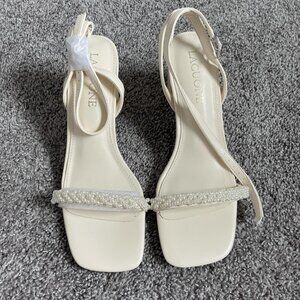 Women's Cream and White Courts